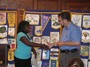 Makeda Njoroge receives her scholarship from Rich Medicke
